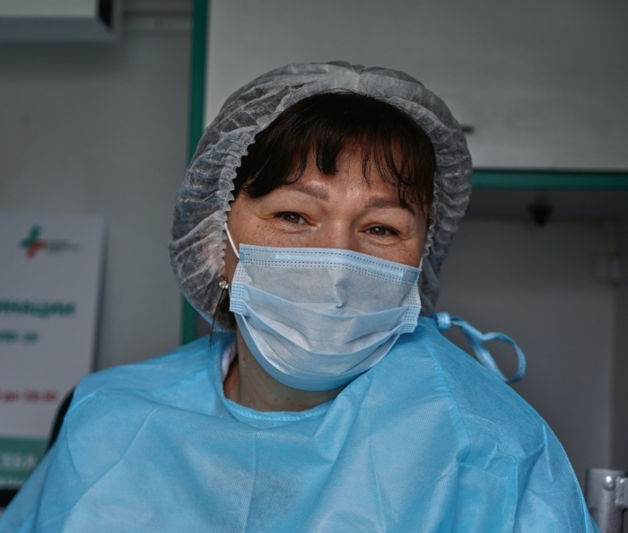 Nurse with mask in government facility