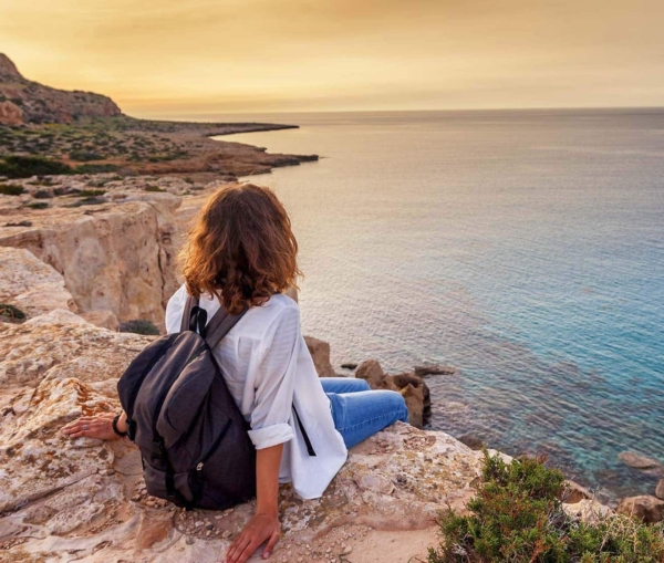 Woman overlooking at the sea